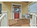 Close-up of the porch, complete with swing and charming details at 725 Oakland Se Ave, Atlanta, GA 30315
