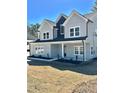 Beautiful two-story home with a gray exterior and black accents at 4863 Amsler Rd, Ellenwood, GA 30294