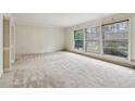 Large living room with wall-to-wall carpeting and lots of natural light at 1161 Wild Creek Ne Trl, Atlanta, GA 30324