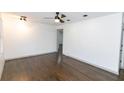Bright living room with hardwood floors and ceiling fan at 2105 Fellowship Rd, Tucker, GA 30084