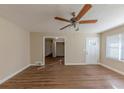 Spacious living room with hardwood floors and ceiling fan at 3235 Mcafee Rd, Decatur, GA 30032