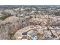 Neighborhood aerial view featuring homes with manicured yards and tree-lined streets at 2994 Ash Grv, Conyers, GA 30094