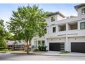 Modern white home with two-car garage and mature trees at 520 Wabash Ne Ave # B, Atlanta, GA 30312