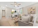 Bright living room featuring hardwood floors, neutral decor, and ample natural light at 2060 Westwood Ave, Atlanta, GA 30310