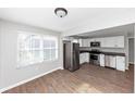 Modern kitchen with stainless steel appliances and white cabinets at 2343 Carver Nw Dr, Atlanta, GA 30314