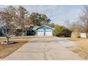 Spacious driveway leading to a two-car garage at 110 Fox Meadow Dr, Covington, GA 30016