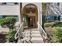 Building entrance with stairs and arched entryway at 3236 Henderson Mill Rd # 6, Atlanta, GA 30341