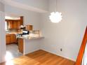 Light and airy dining area with hardwood floors and kitchen views at 2058 Powers Ferry Se Trce, Marietta, GA 30067
