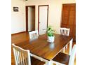 Dining room with wooden table, four chairs, and hardwood floors at 40 Chimney Rise Ct, Stockbridge, GA 30281