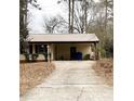 Residential home featuring a driveway leading to the front entrance and a well-kept lawn at 40 Chimney Rise Ct, Stockbridge, GA 30281