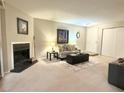 Living room features a fireplace and ample space for furniture at 224 Seasons Pkwy, Norcross, GA 30093