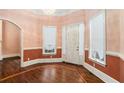 Elegant entry with hardwood floors, two-toned walls, and crown molding at 159 Cedar Creek Rd, Cartersville, GA 30121