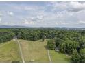Property with house, large yard, and mountain views at 416 Spring Place Ne Rd, White, GA 30184