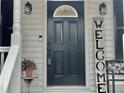 Modern black front door adds curb appeal to this home at 4320 Center Hill Church Rd, Loganville, GA 30052
