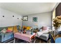 Bright and airy living room with ample seating at 792 Plainville Sw Cir, Atlanta, GA 30331