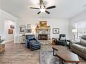 Living Room with fireplace and comfortable seating at 1018 Cherry Bark Ln, Loganville, GA 30096
