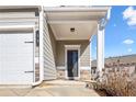 Townhome front entrance with covered porch and stone accents at 38 Rocky Knl, Dallas, GA 30157