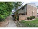 Rear view of townhome with wooden privacy fence and patio at 4701 Flat Shoals Rd # 57A, Union City, GA 30291