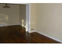 Spacious living area with hardwood floors and a chandelier at 1634 Willis Mill Sw Rd, Atlanta, GA 30311