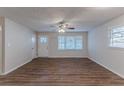 Bright living room featuring hardwood floors and a ceiling fan at 404 Utoy Sw Cir, Atlanta, GA 30331