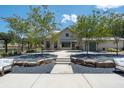 Community courtyard with seating and landscaping at 5330 Memento Trace, Cumming, GA 30040