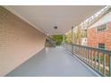 Covered patio with stairs to back yard at 3401 Tulip Dr, Decatur, GA 30032