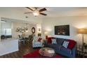 Spacious living area with hardwood floors and dining area at 547 Granville Ct, Atlanta, GA 30328