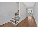 Hardwood floor entryway with staircase and view to Gathering room at 1010 Bergeron Pl, Sandy Springs, GA 30328