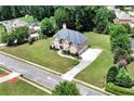 Large home on a spacious lot with a long driveway at 1426 Greenridge Trl, Lithonia, GA 30058