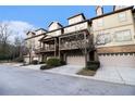Townhome community featuring multiple units with attached garages at 3204 Saute Way, Avondale Estates, GA 30002