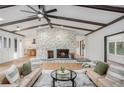 Spacious living room with stone fireplace and high ceilings at 776 Sugar Creek Se Trl, Conyers, GA 30094