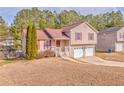 House with brown roof, deck, and backyard at 108 Ivy Trace Ln, Dallas, GA 30157