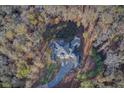 Luxury home nestled in a wooded lot with ample parking at 1628 Golden Creek Sw Ct, Conyers, GA 30094