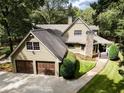 Aerial view of house, detached garage, and landscaped grounds at 969 Knox Chapel Rd, Social Circle, GA 30025