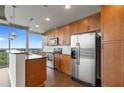 Modern kitchen with stainless steel appliances and granite countertops at 855 Peachtree Ne St # 2914, Atlanta, GA 30308