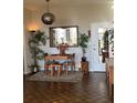 Dining area with modern light fixture, seating for four, and an open view to the exterior at 3060 Pharr Court N # 607, Atlanta, GA 30305