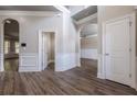 Spacious entryway featuring hardwood floors and an open floor plan at 5590 Vickery Cir, Cumming, GA 30040