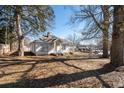White house with a front yard and surrounding trees at 2930 Dallas Nw St, Kennesaw, GA 30144