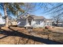 White one-story house with a porch and steps leading to the entrance at 2930 Dallas Nw St, Kennesaw, GA 30144