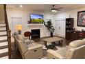 Living room with hardwood floors, fireplace, and comfortable seating at 2708 Eagles Crest Ln, Decatur, GA 30034