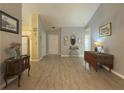 Bright and spacious entryway with wood-look floors and neutral wall colors at 752 Bostonian Way, Lawrenceville, GA 30046