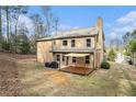 House with deck, pergola, and grilling area at 1005 Greenridge Trl, Loganville, GA 30052
