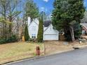 Two-story white house with driveway and landscaping at 2958 Arden Ridge Ter, Suwanee, GA 30024