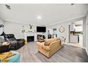 Living room features a fireplace and an open floor plan at 2958 Arden Ridge Ter, Suwanee, GA 30024