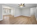 Spacious living room with hardwood floors and an open floor plan at 4642 Mahonia Nw Way, Acworth, GA 30102