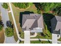 An aerial view of the house and surrounding neighborhood at 1553 Brunswick St, Lithia Springs, GA 30122