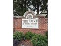 Elegant brick sign for The Cove at Vinings Estates, a premier residential community at 4703 Legacy Cove Ln, Smyrna, GA 30126