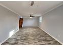 Spacious living room with hardwood floors and ceiling fan at 2422 Tiffany Cir, Decatur, GA 30035