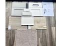 Selection of flooring, cabinetry, and countertop samples for interior design at 3106 Marbella Cir # 3, Kennesaw, GA 30152