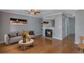 Spacious living room featuring a fireplace and hardwood floors at 643 Windchase Ln, Stone Mountain, GA 30083